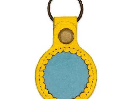 Porte‑AirTag en cuir jaune